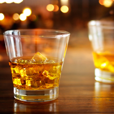 Photo: liquor glasses on bar.